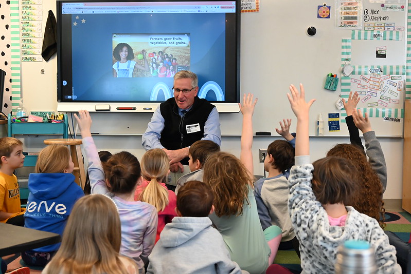 Russell Redding reading to students at 2024 Ag
