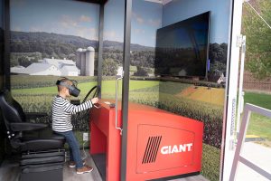 young visitor to the virtual tractor drive